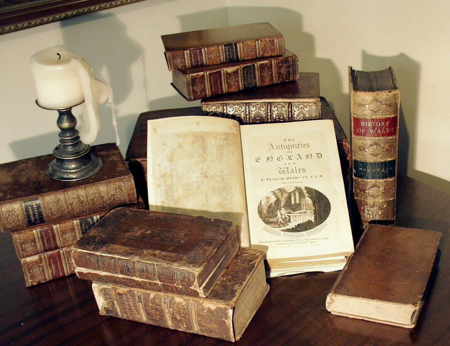 Books piled on a desk