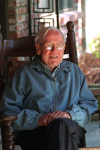 Elderly man sitting in a chair