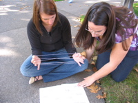 Playing Cat's Cradle with string.