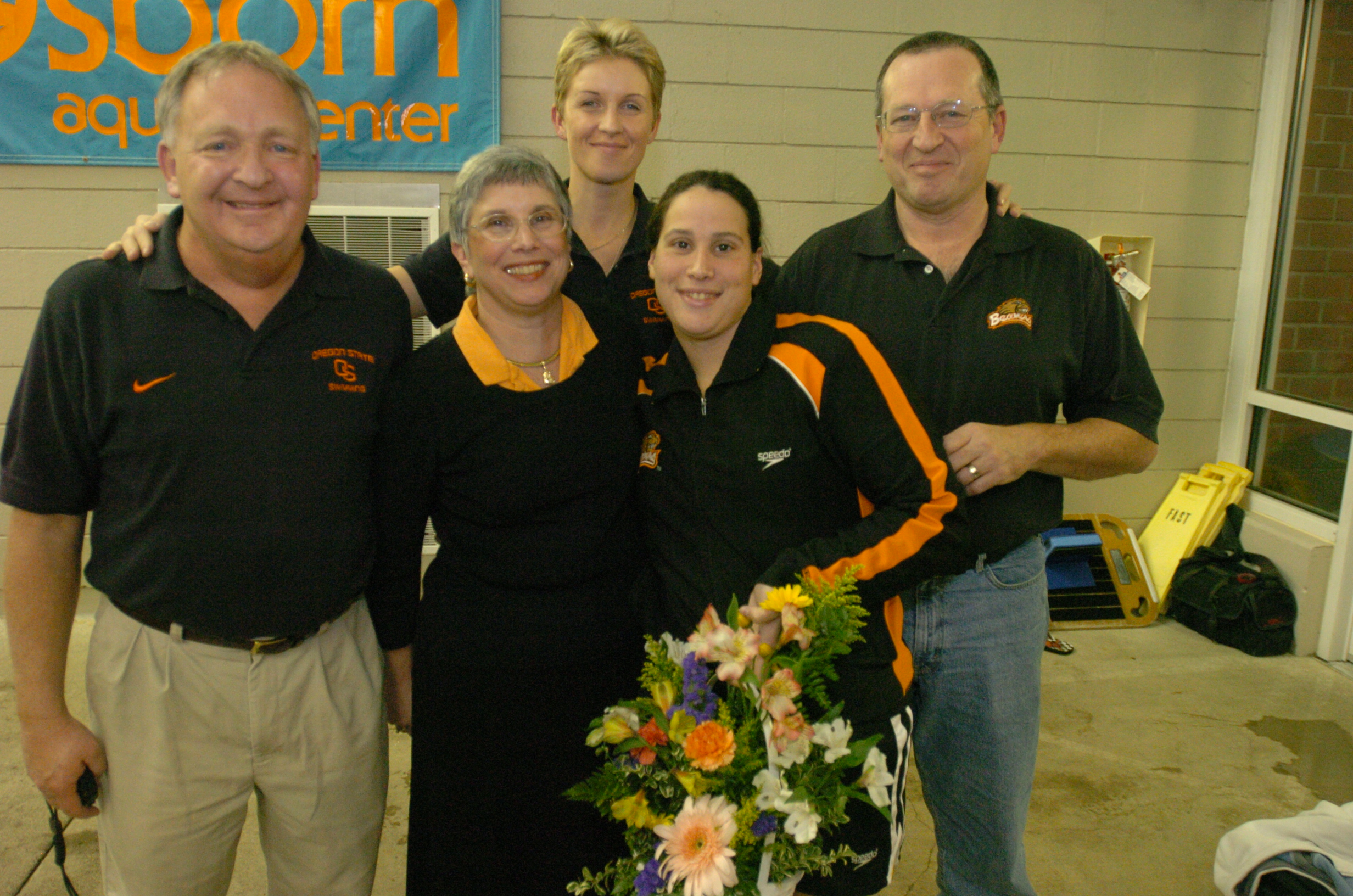 My coaches, parents and I at my last home meet.