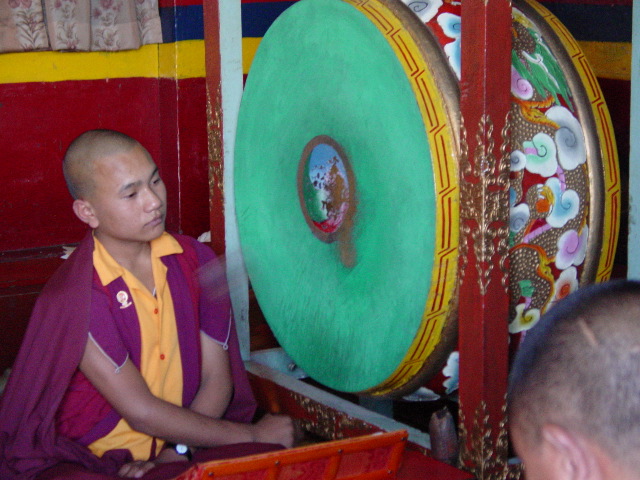 THe youngest monk played the drum during parts of the meditation session.