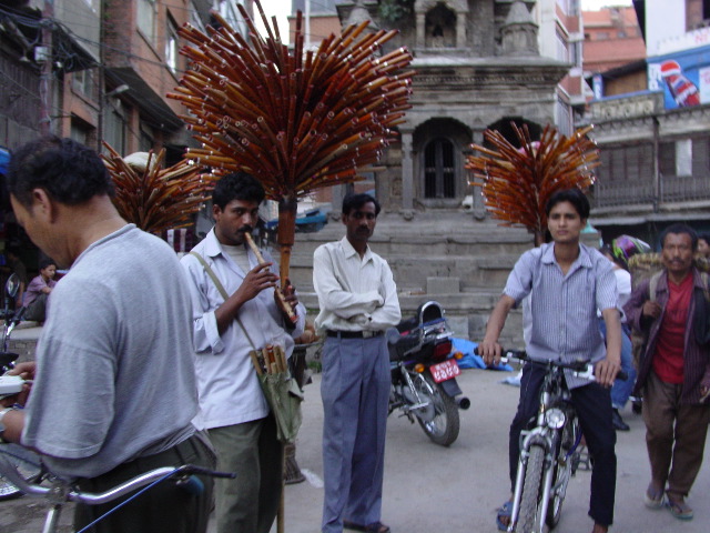 These gentlemen were selling whistles that were cleverly carted about the streets.