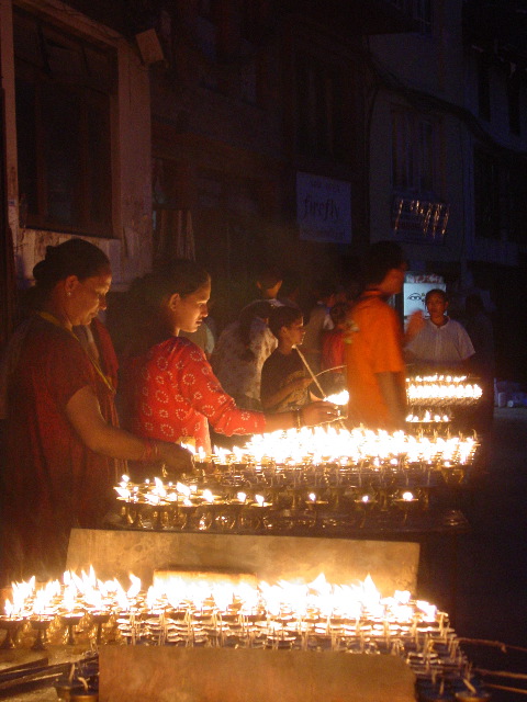 At night hundreds of Buddhists circumambulated about the stupa lighting candles and chanting