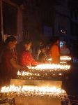 At night hundreds of Buddhists circumambulated about the stupa lighting candles and chanting